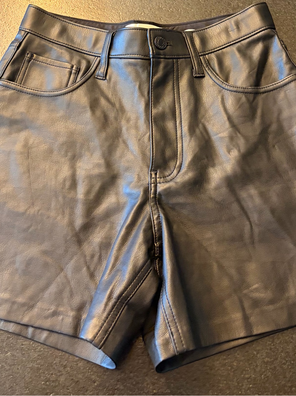 Abercrombie & Fitch High-Rise Faux Leather Shorts.